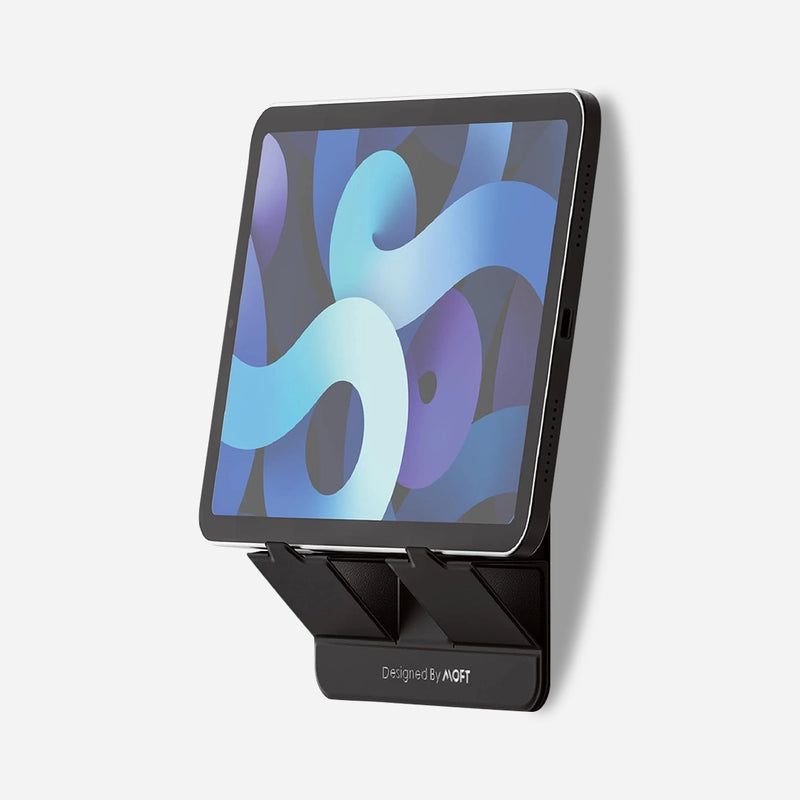 Adhesive wall stand and snap pad